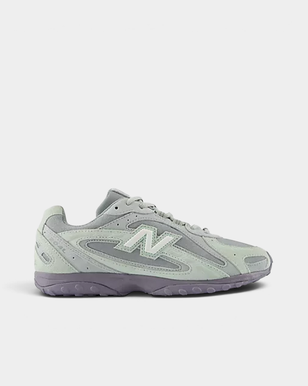 New Balance 204L sneaker in silver moss and lone star grey suede, side view showing the arced overlays, white N logo and bayberry purple outsole