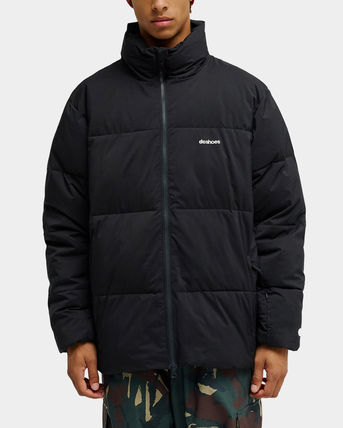 DC Trackstar 10K puffer jacket in black, a technical snow jacket with a two-way front zip and adjustable hem
