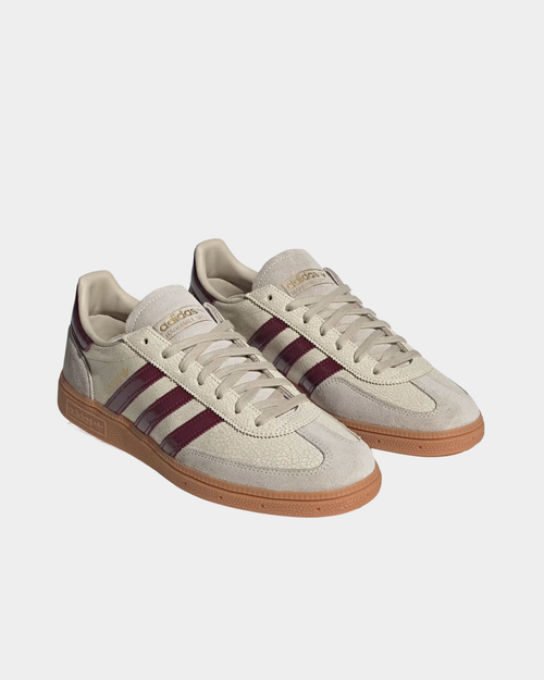 adidas Handball Spezial in off white with shadow red, low-top leather and suede sneakers on a gum sole