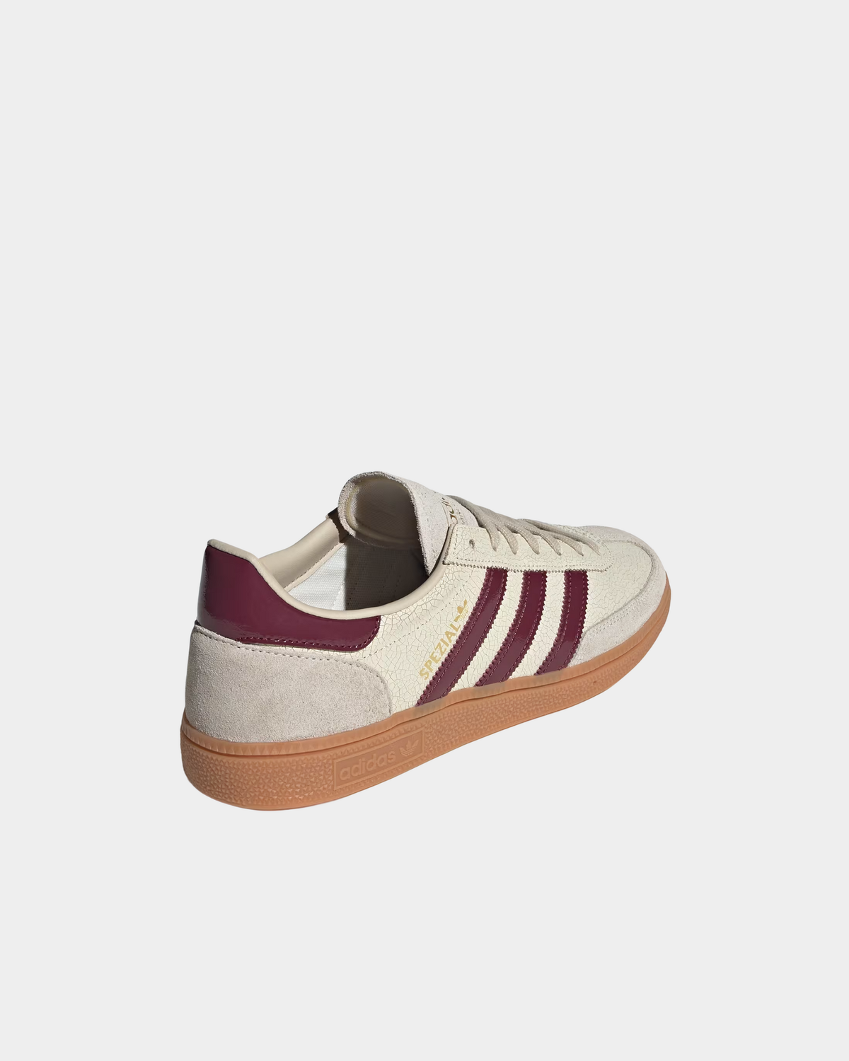 adidas Handball Spezial in off white with shadow red, low-top leather and suede sneakers on a gum sole