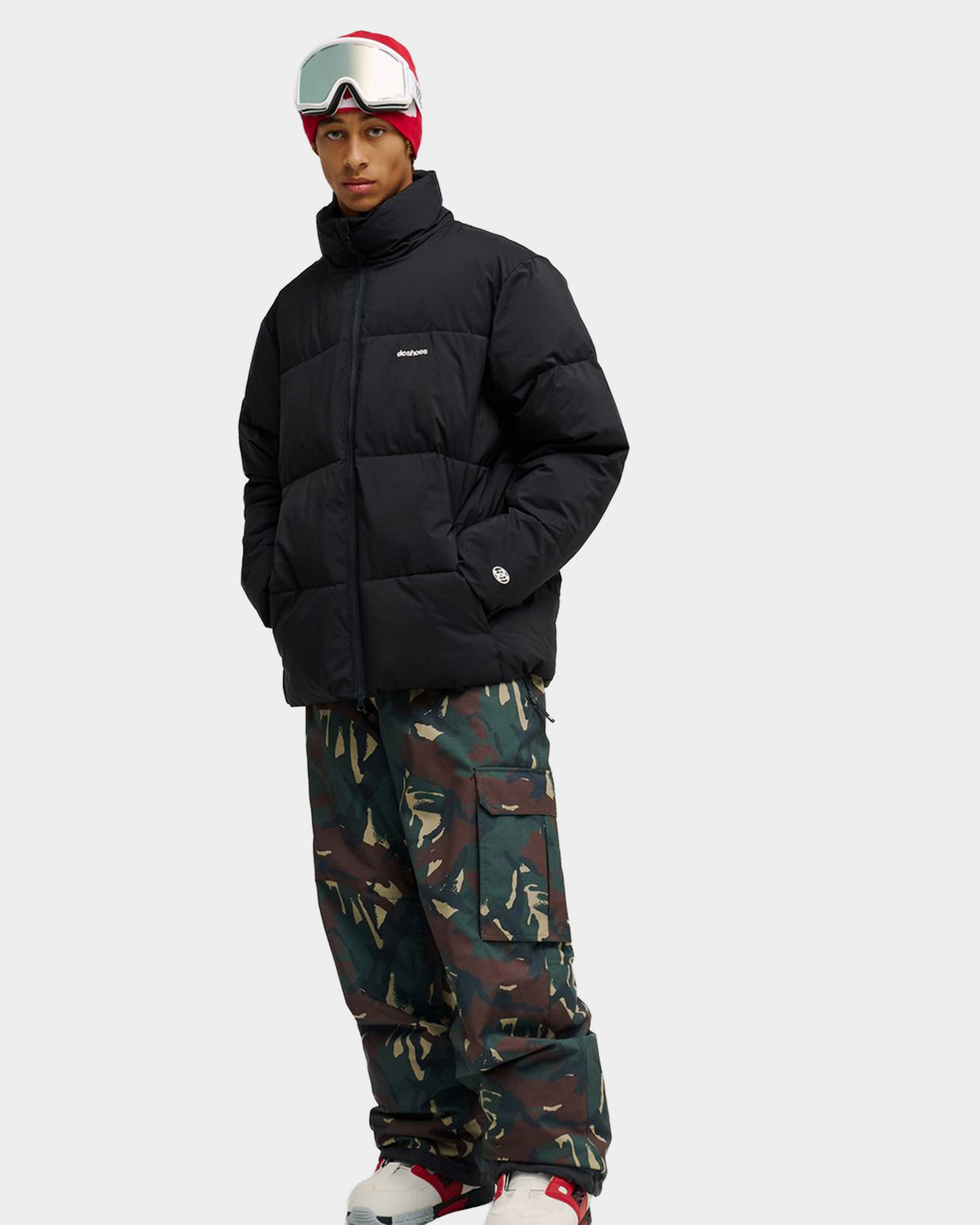 DC Trackstar 10K puffer jacket in black, a technical snow jacket with a two-way front zip and adjustable hem