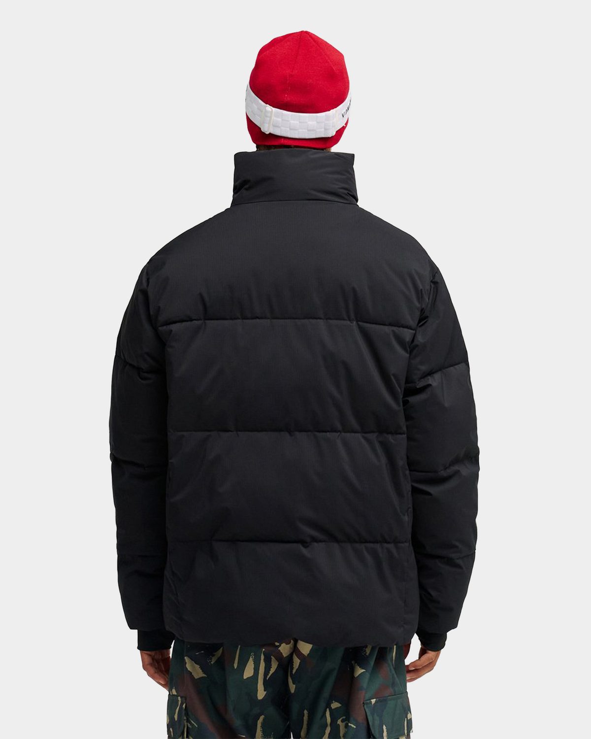 DC Trackstar 10K puffer jacket in black, a technical snow jacket with a two-way front zip and adjustable hem