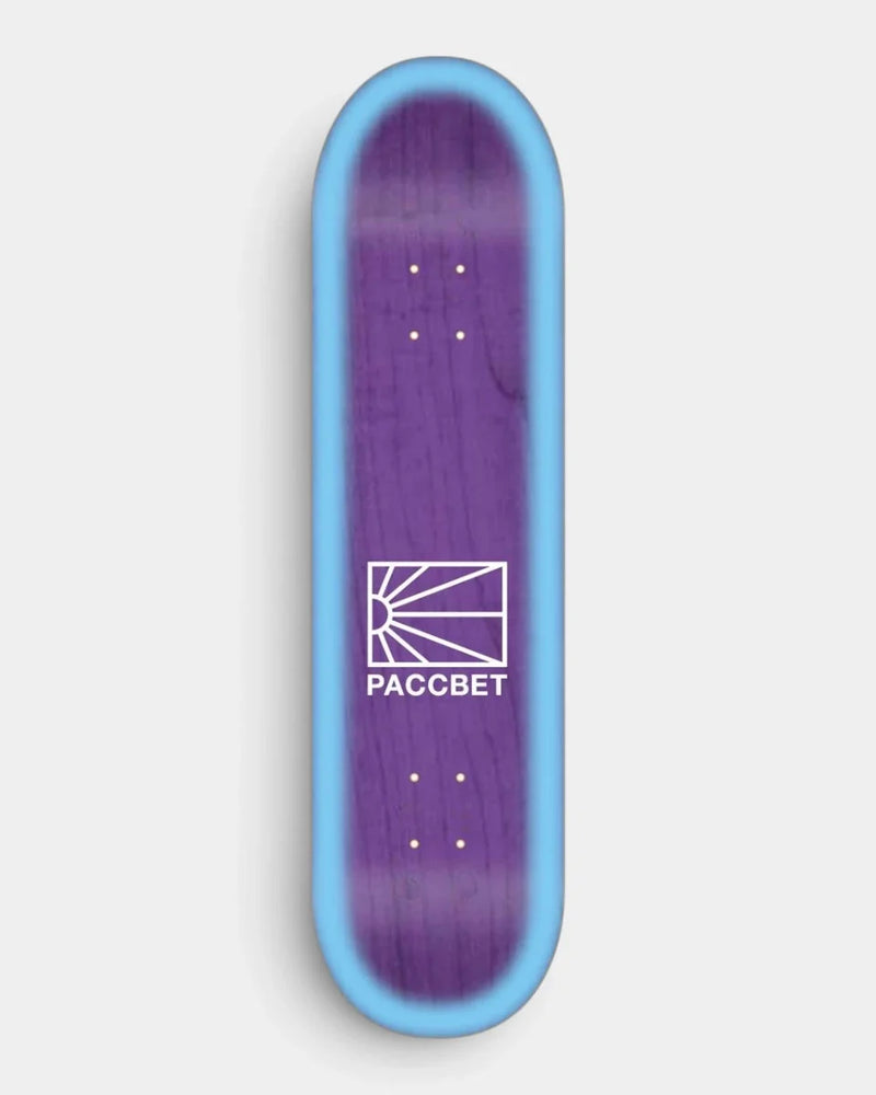 Lockwood Avenue Rassvet Logo Purple Blue 8.5 inch skateboard deck with a white PACCBET logo on a purple board with a light blue edge