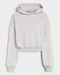 Lockwood Avenue adidas adiSignature 3-Stripes Hoodie in light grey heather, flat front view of the oversized cropped fit with cream 3-Stripes down the sleeves and a small Trefoil