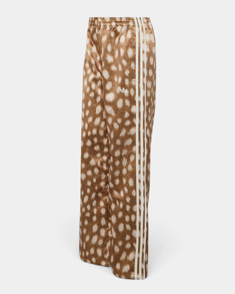 Lockwood Avenue adidas Firebird Animal Print Track Pants in a brown fawn-spot print, shown on their own with cream 3-Stripes down the side