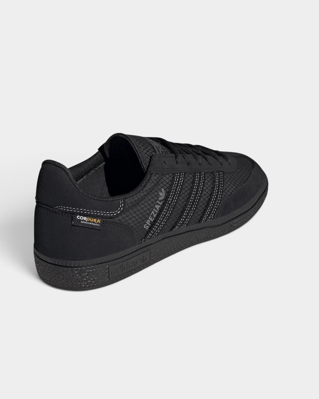 Lockwood Avenue adidas Handball Spezial shoe in all black with a CORDURA ripstop quarter and suede overlays, seen from behind at an angle, the heel with the CORDURA label and the black outsole
