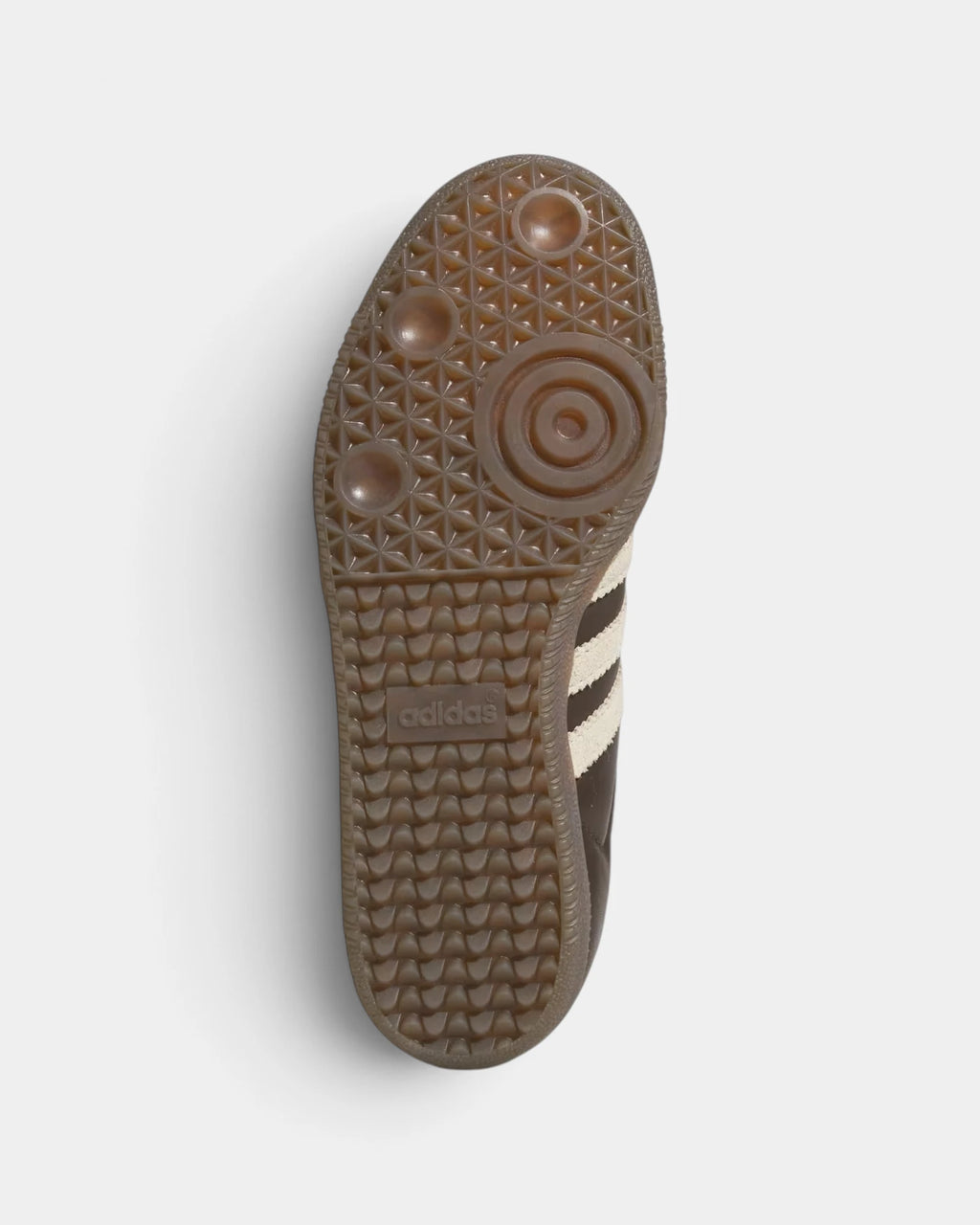 Lockwood Avenue adidas Samba OG W shoe turned over, showing the gum outsole and its pivot circle