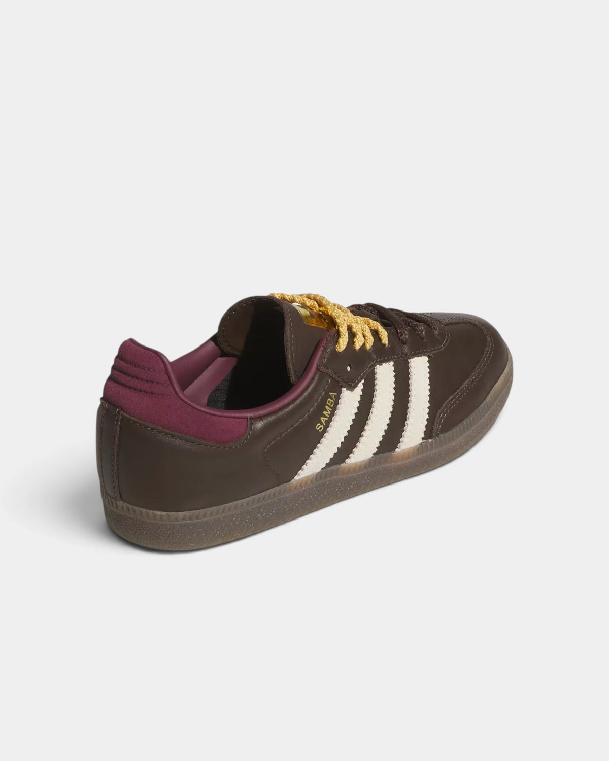 Lockwood Avenue adidas Samba OG W shoe in brown leather seen from behind, maroon collar and gold adidas lettering on the heel
