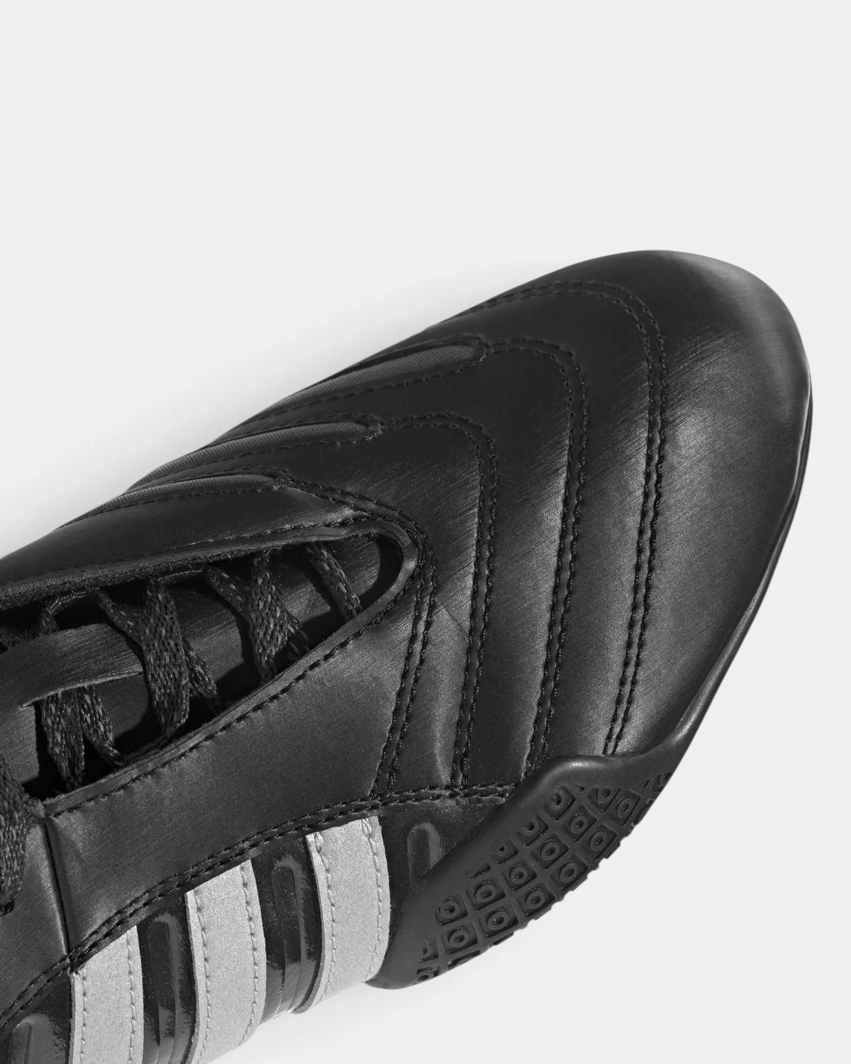 Lockwood Avenue adidas Taekwondo Mei Elite shoe close up, the laces and stitched black toe