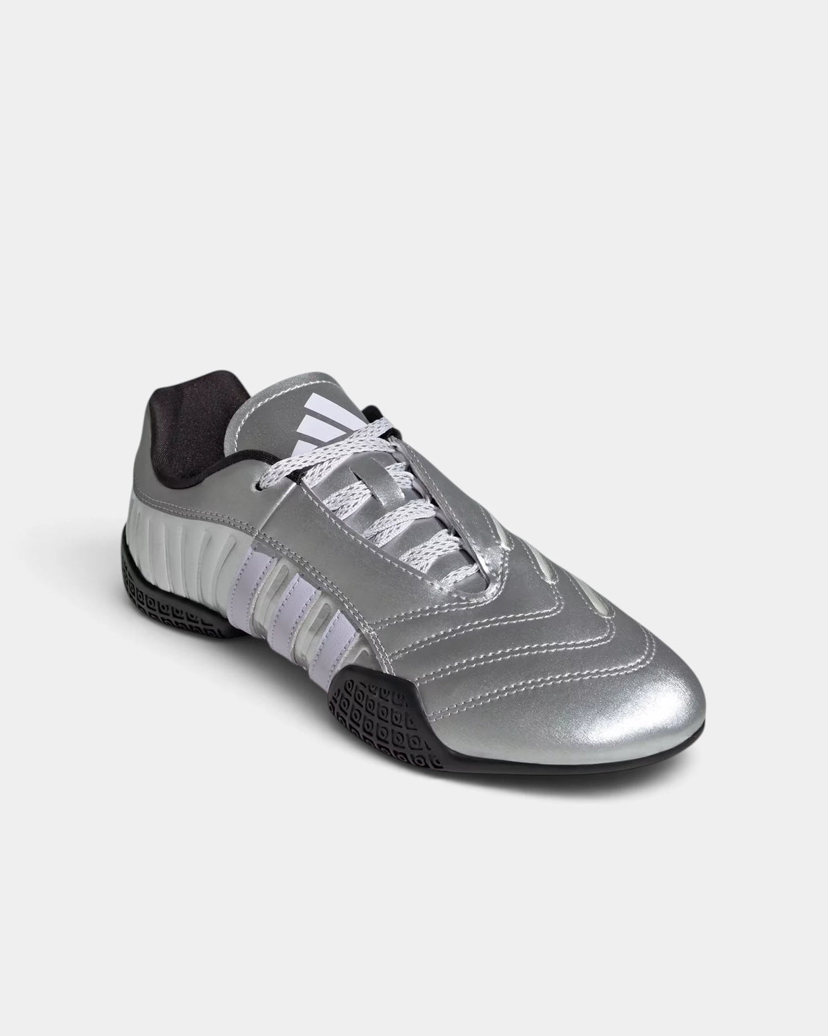 Lockwood Avenue adidas Taekwondo Mei Elite shoe in silver metallic, angled front view with the asymmetric lacing and pale purple 3-Stripes