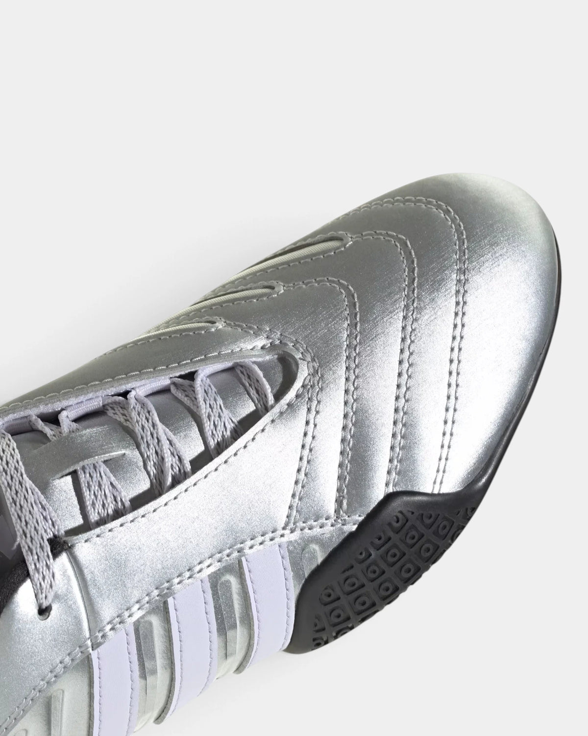 Lockwood Avenue adidas Taekwondo Mei Elite shoe close up, the laces and stitched silver metallic toe