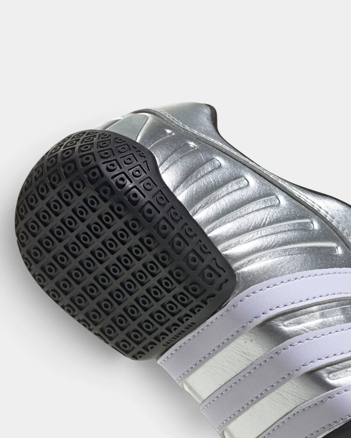 Lockwood Avenue adidas Taekwondo Mei Elite shoe close up, the black heel outsole and its grip pattern