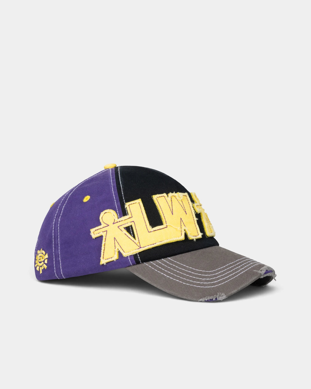 Lockwood Avenue ADWYSD Human Logo 5-Panel Cap in Purple/Black/Yellow seen from the side, purple and black panels with contrast stitching and yellow eyelets
