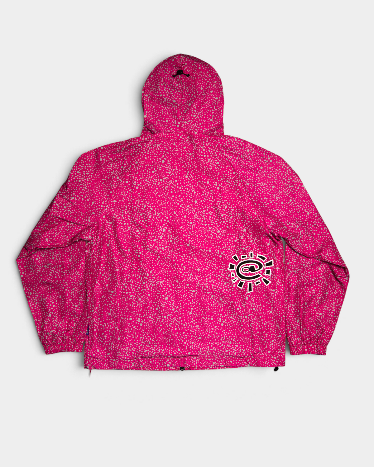 Lockwood Avenue ADWYSD Dotted Bandemic Jacket in Fuchsia seen from the back, a black and white @ sun logo on the lower back