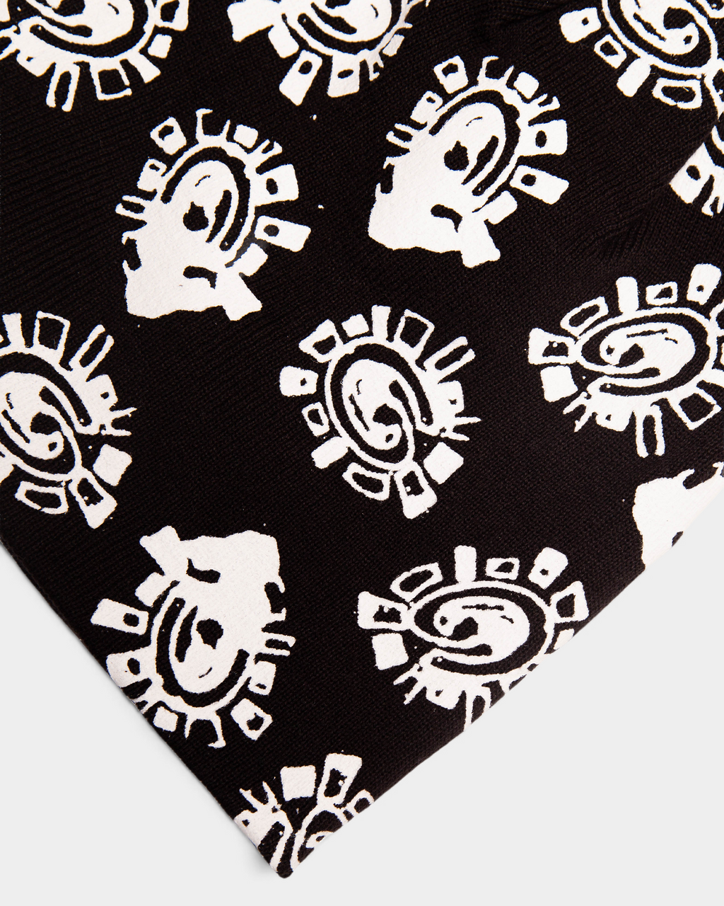 Lockwood Avenue ADWYSD Grunge @Sun All Over Print Beanie in Black, close-up of the white @ sun print on black knit