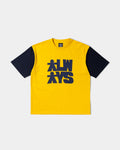 Lockwood Avenue ADWYSD Human T-Shirt in Yellow/Navy, front view of the yellow body with dark navy sleeves and the stacked ALWAYS human logo print on the chest