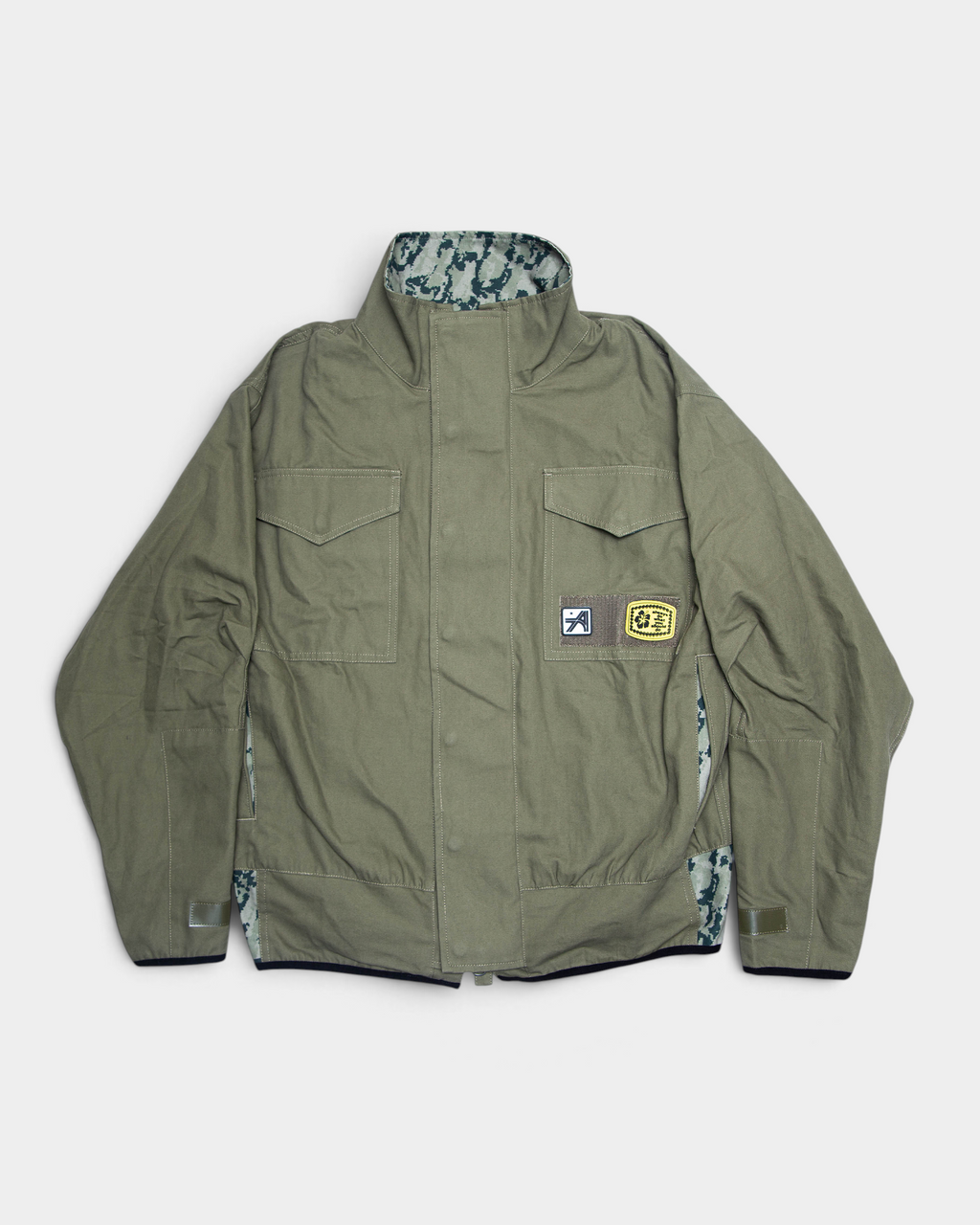 Lockwood Avenue ADWYSD NZ Digi Field Jacket in Green, front view of the olive field jacket with snap placket, flap chest pockets and a woven patch