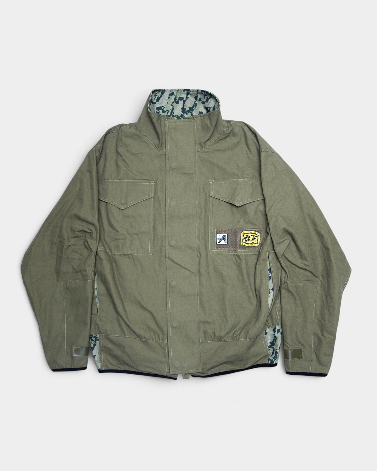 Lockwood Avenue ADWYSD NZ Digi Field Jacket in Green, front view of the olive field jacket with snap placket, flap chest pockets and a woven patch