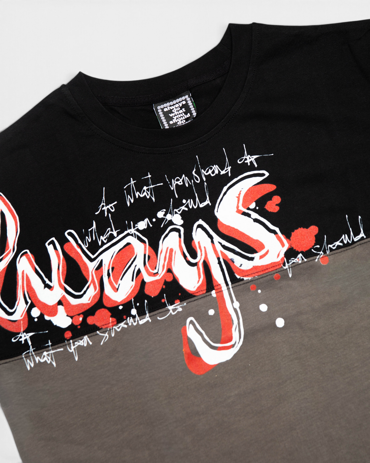 Lockwood Avenue ADWYSD Waza Panelled T-Shirt in Grey/Black, close-up of the white and red scribbled always print and the woven neck label