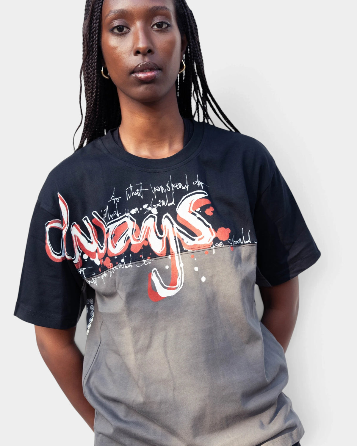 Lockwood Avenue ADWYSD Waza Panelled T-Shirt in Grey/Black, worn by a model facing the camera, white and red scribbled always print across the seam