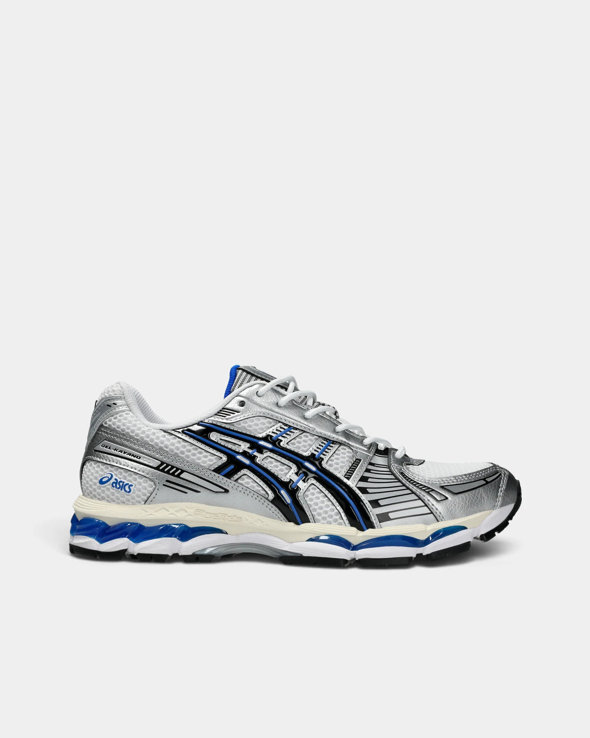 Asics GEL-Kayano 12.1 Shoes in White/Black, side profile: white mesh under silver overlays, black ASICS stripes piped in blue, blue GEL windows in a cream midsole