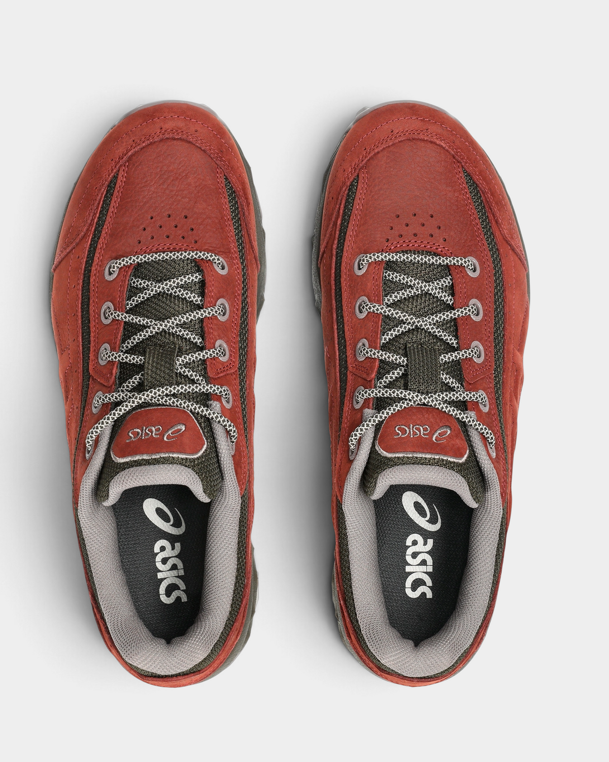 Asics GEL-Transcend FJ Shoes in Rusted Rock/Black Coffee, pair from above with gray laces over a rust-red upper and the ASICS logo on the insoles