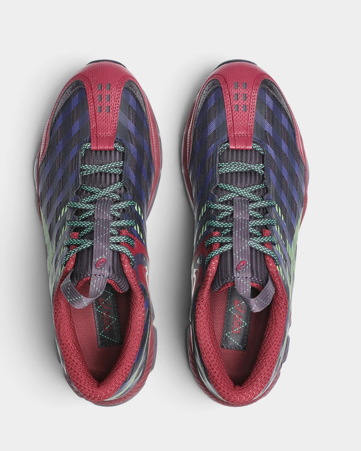 Asics US8-S GEL-SJ33 Shoes in Deep Plum/Fresh Grass, pair from above with teal-green laces, burgundy collars and a burgundy toe cap, and the navy plaid weave across the vamp