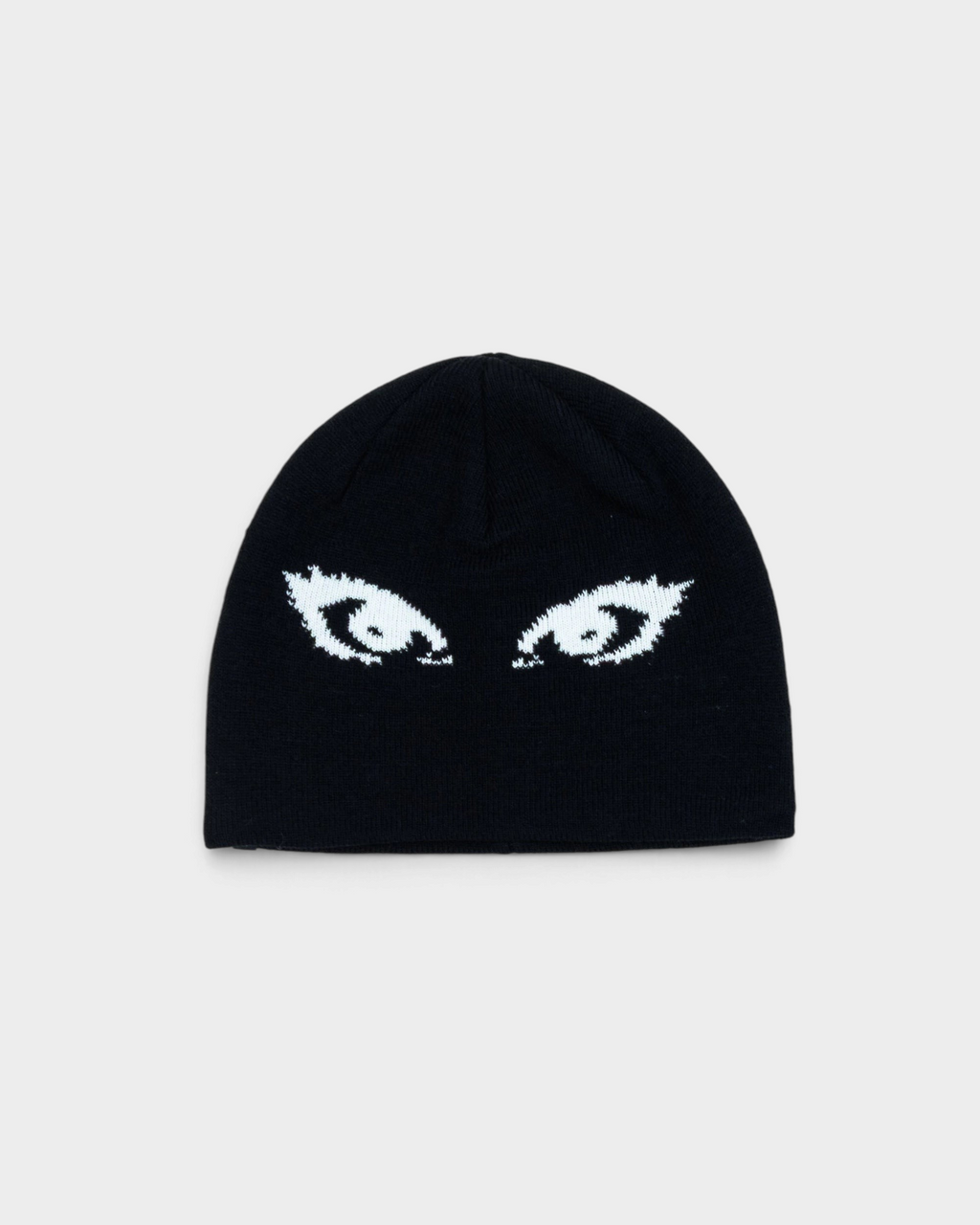 Lockwood Avenue Beyond Medals Jacquard Beanie Eyes in black, laid flat, a close-fitting beanie with a pair of white lashed eyes knitted across the front