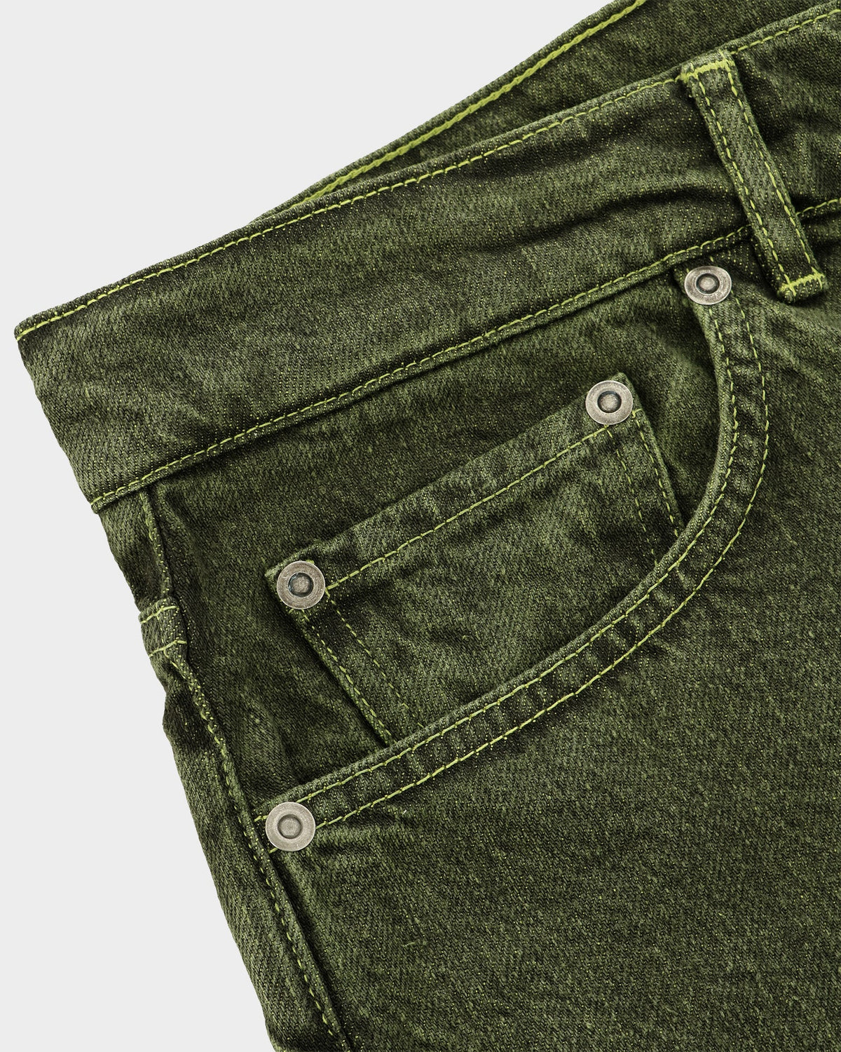 Close-up of the front pocket, rivets and lime contrast stitching on the Poison Green Classic Relaxed Jeans
