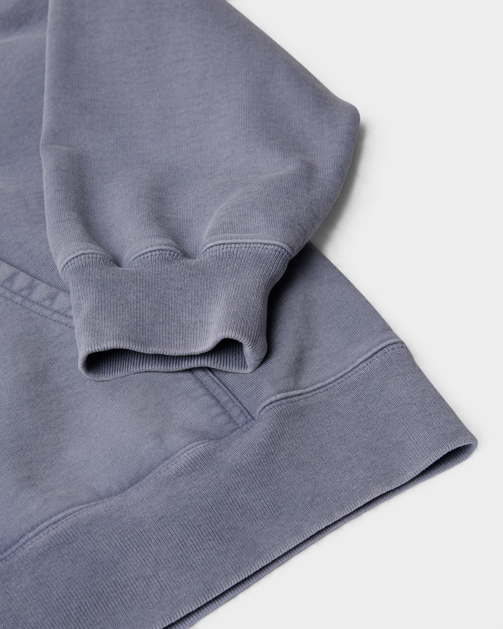 by Parra A Cross to Bear Zip Hooded Sweatshirt - Blue, close-up of the ribbed cuff and hem