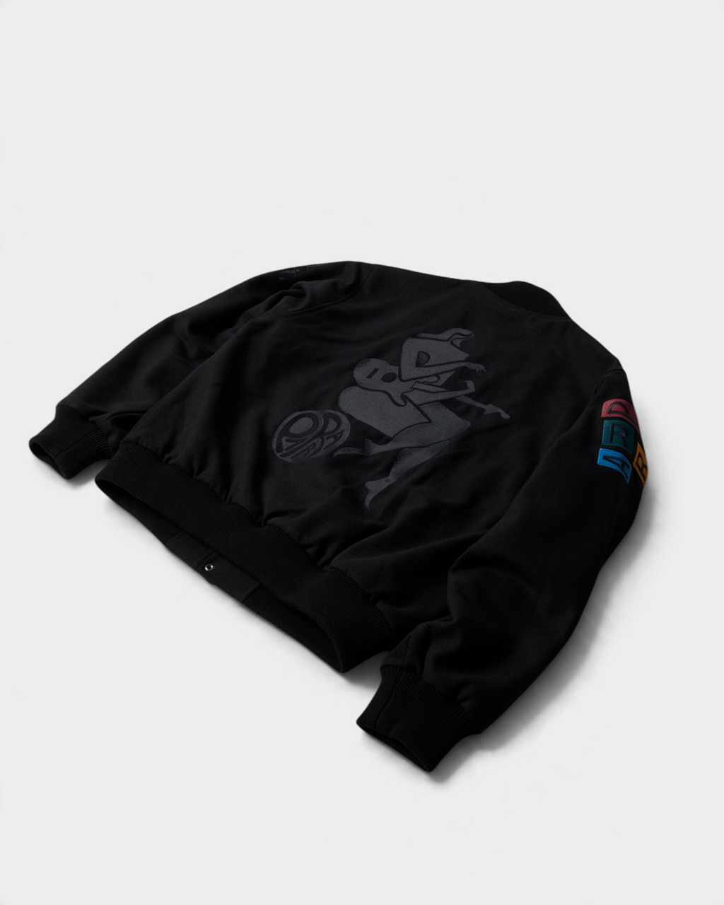 by Parra All the Best Varsity Jacket - Black, angled view of the back