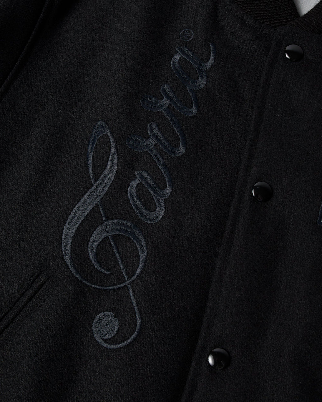 by Parra All the Best Varsity Jacket - Black, close-up of the tonal Parra script embroidery