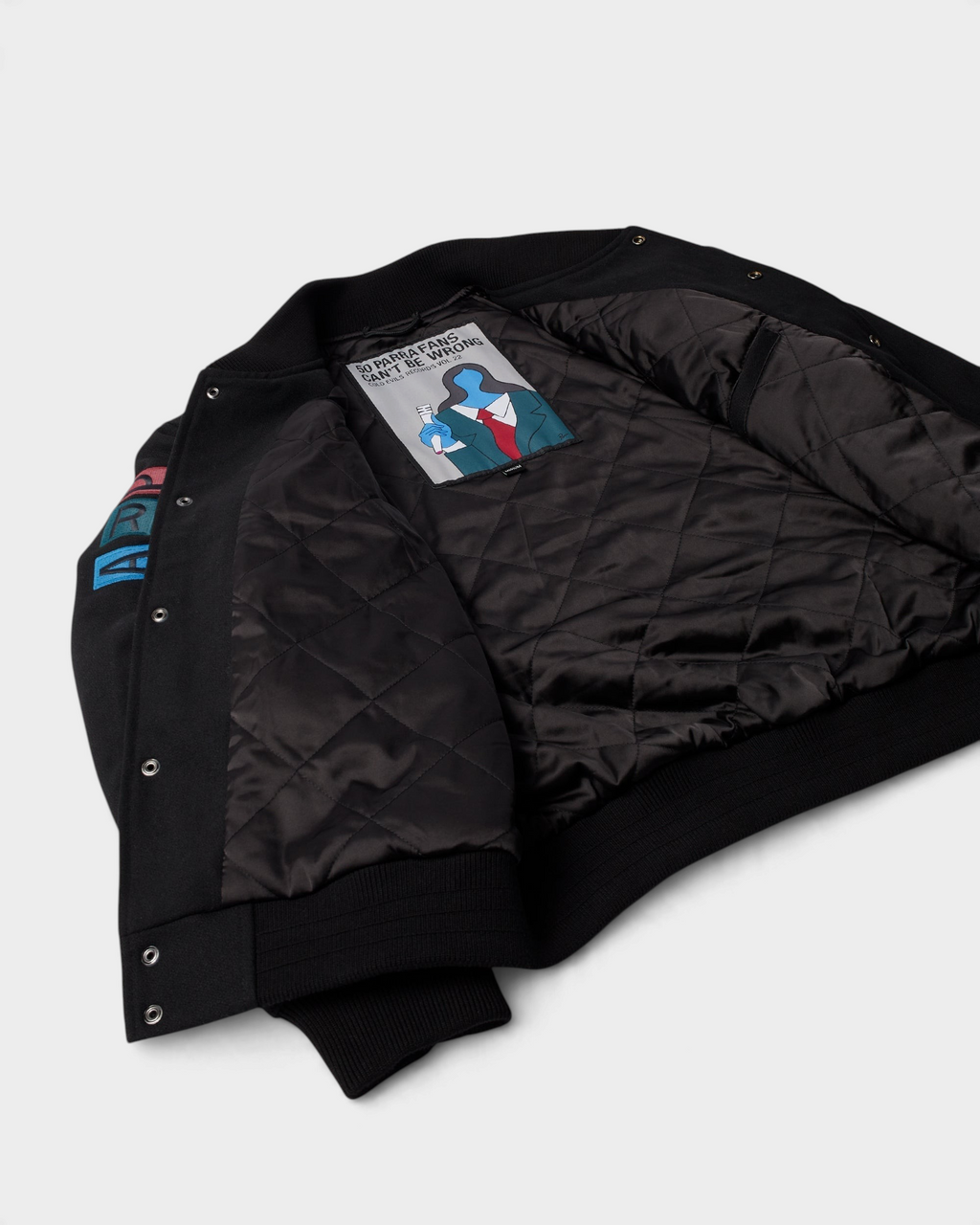 by Parra All the Best Varsity Jacket - Black, angled view, opened up