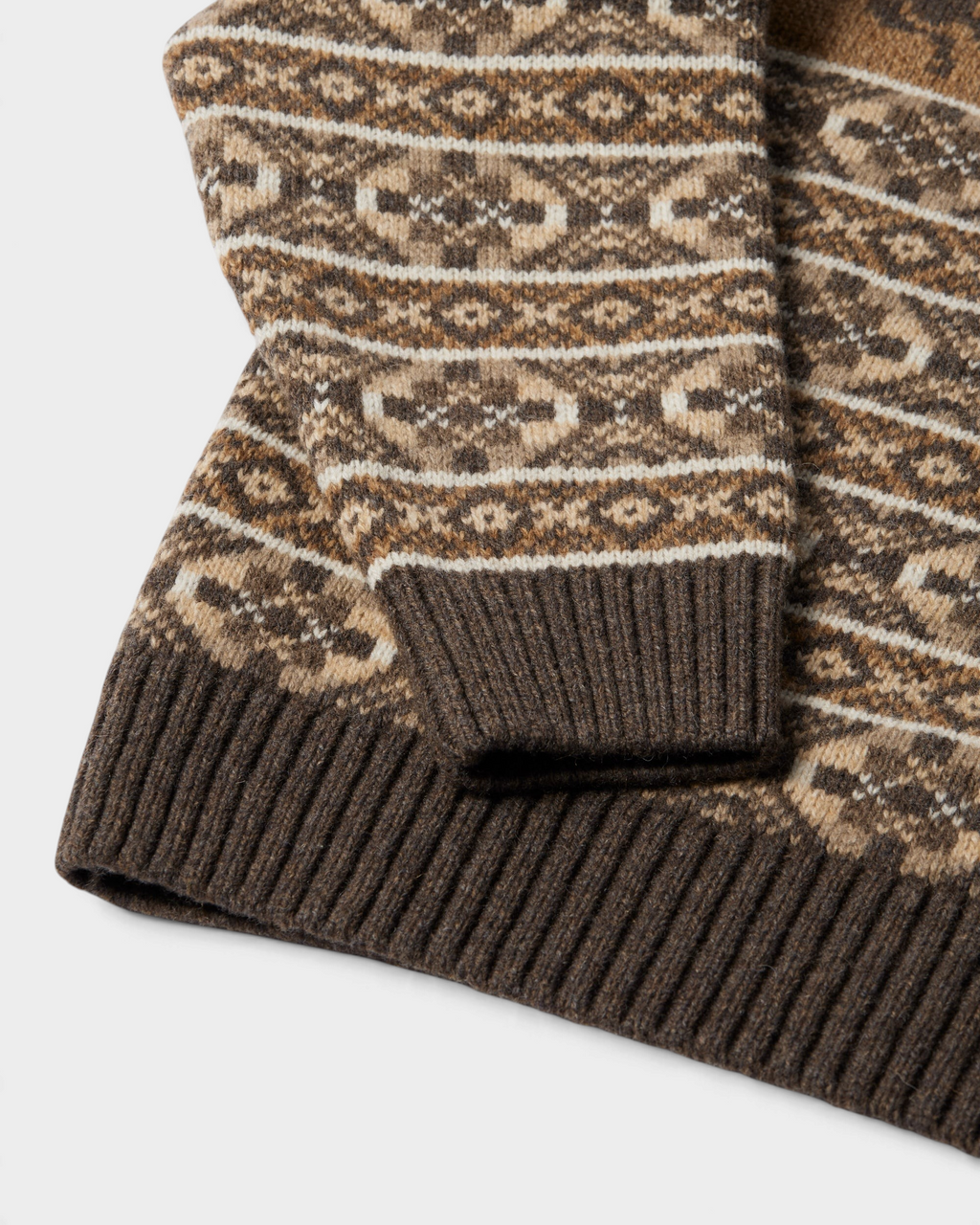 by Parra Cactus Bull Knitted Pullover - Brown, close-up of the ribbed cuff and hem