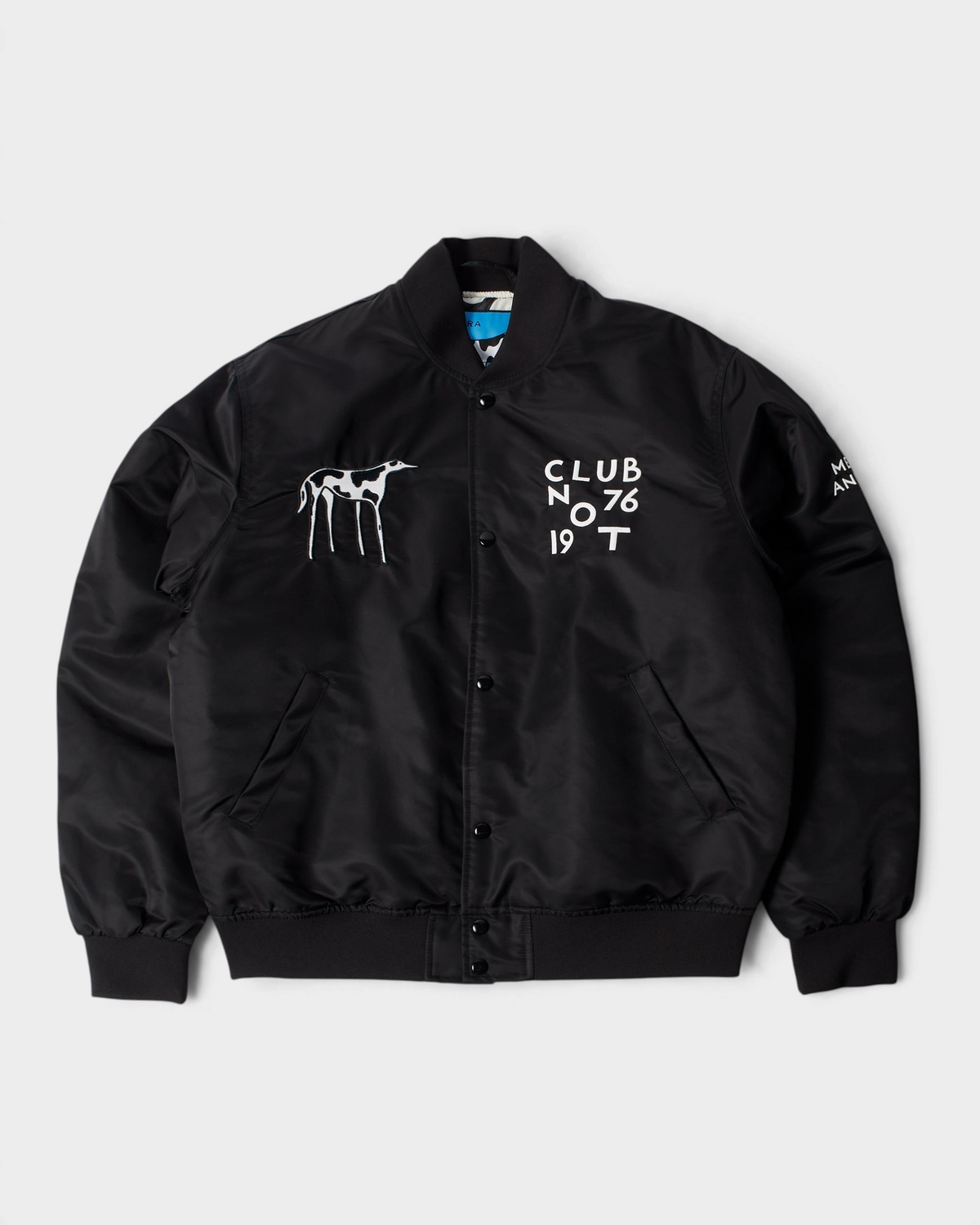 by Parra Club Not 1976 Satin Bomber Jacket - Black, front flat-lay with the embroidered dog and Club Not 1976 on the chest