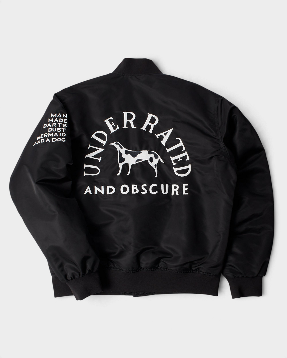 by Parra Club Not 1976 Satin Bomber Jacket - Black, back flat-lay with the large Underrated and Obscure dog embroidery