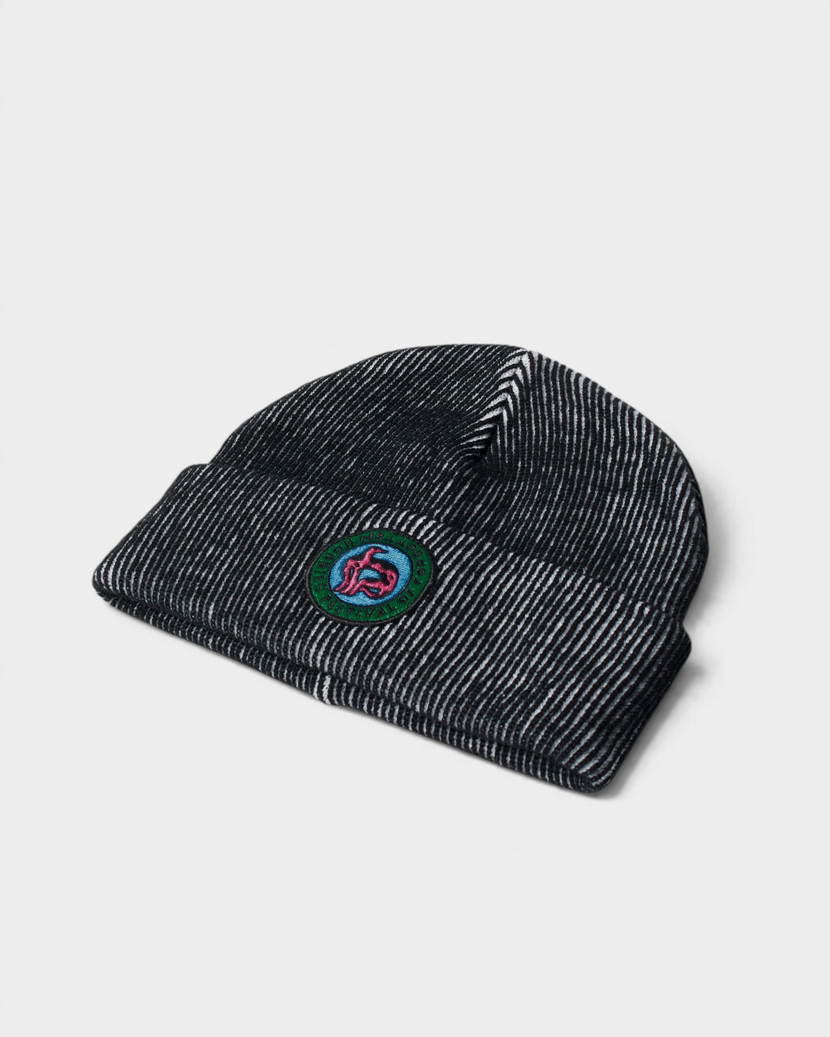 by Parra Forgotten Hobbies Beanie - Black, angled view lying flat