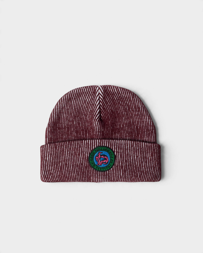 by Parra Forgotten Hobbies Beanie - Dark Red, front view with the round Forgotten Hobbies patch on the cuff
