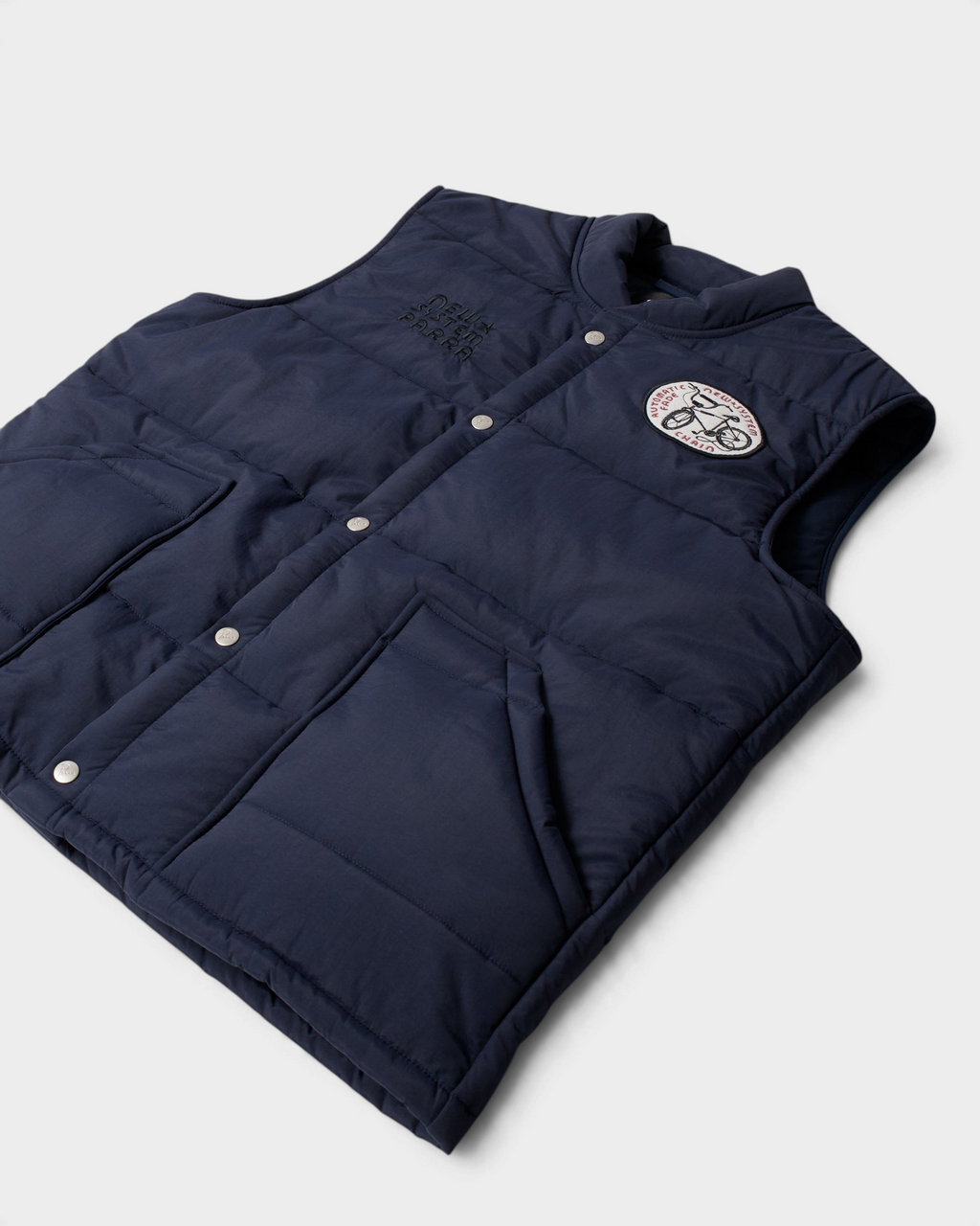 by Parra New System Puffer Vest - Navy Blue, angled view of the front