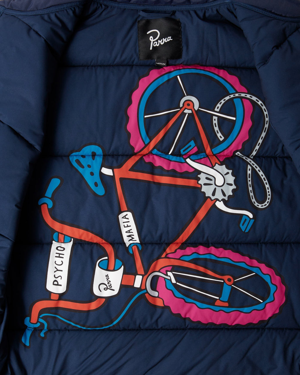 by Parra New System Puffer Vest - Navy Blue, close-up of the bicycle print on the lining