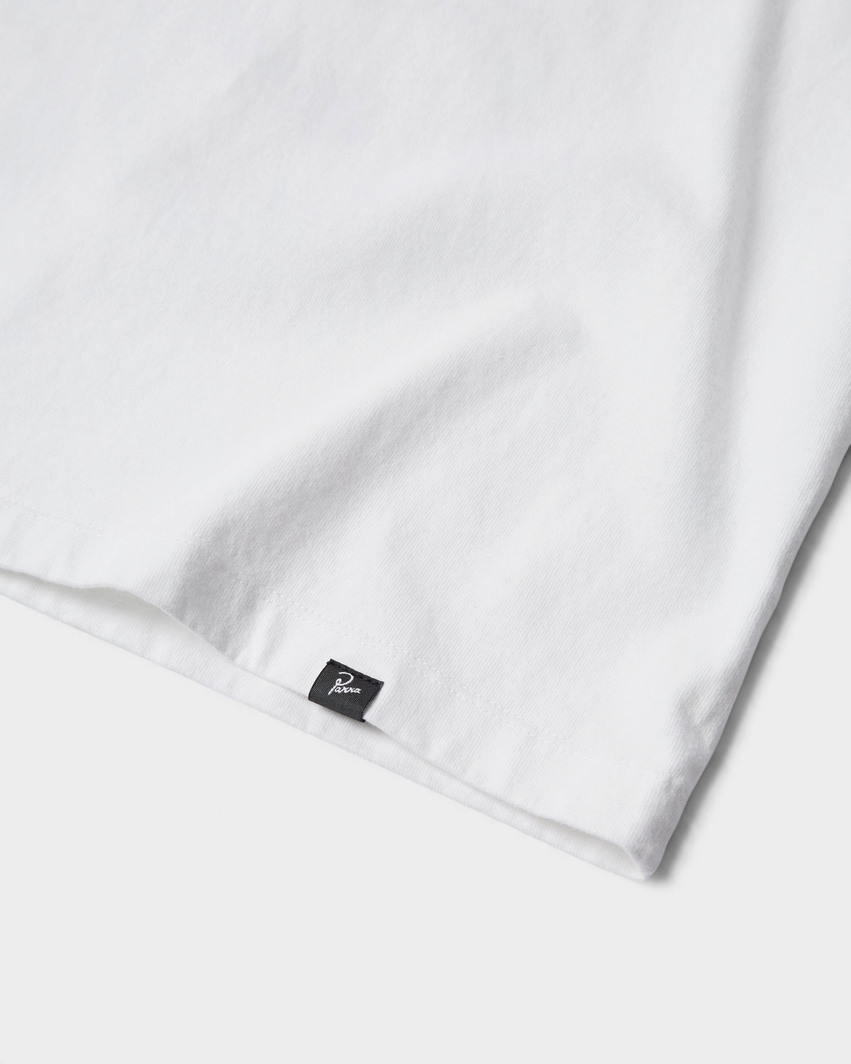 by Parra Not Another Boat T-Shirt - White, close-up of the woven Parra label at the hem