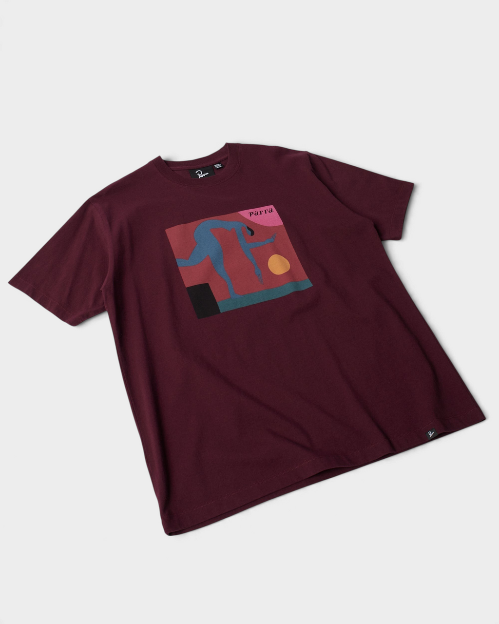 by Parra Tripped Up T-Shirt - Dark Red, angled view of the front