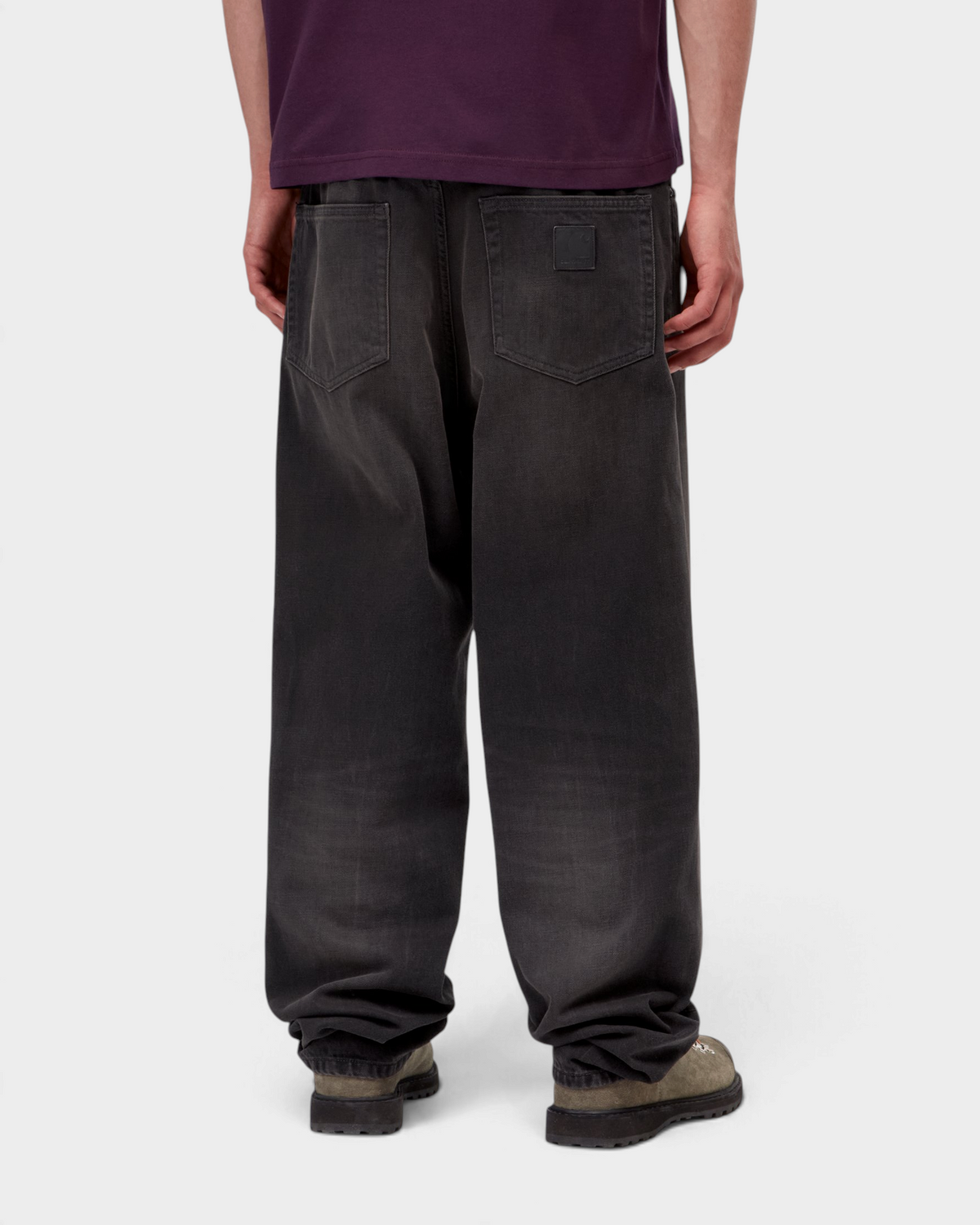 Carhartt Aaron Pants - Black, Tobacco Used Wash, worn by a model