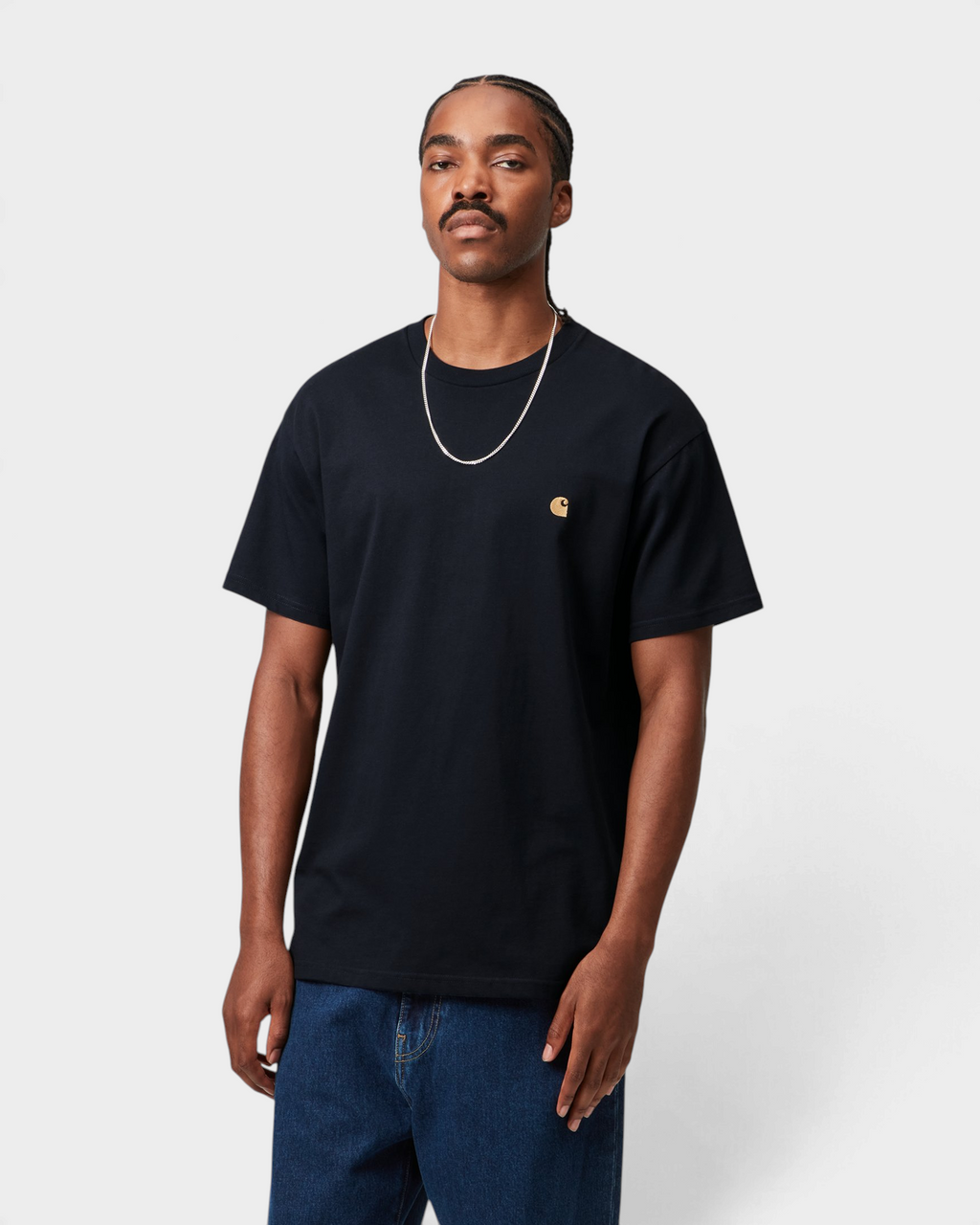 Carhartt Chase T-Shirt - Dark Navy/Gold, worn by a model