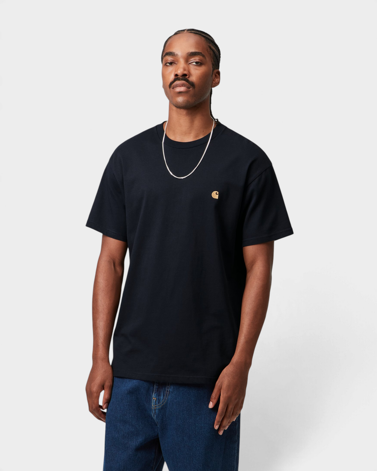 Carhartt Chase T-Shirt - Dark Navy/Gold, worn by a model