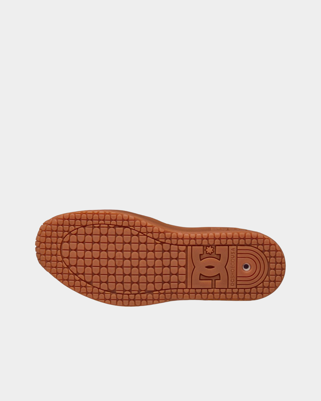 Gum rubber outsole of the DC Lynx OG, showing the tread pattern and the moulded DC logo at the heel