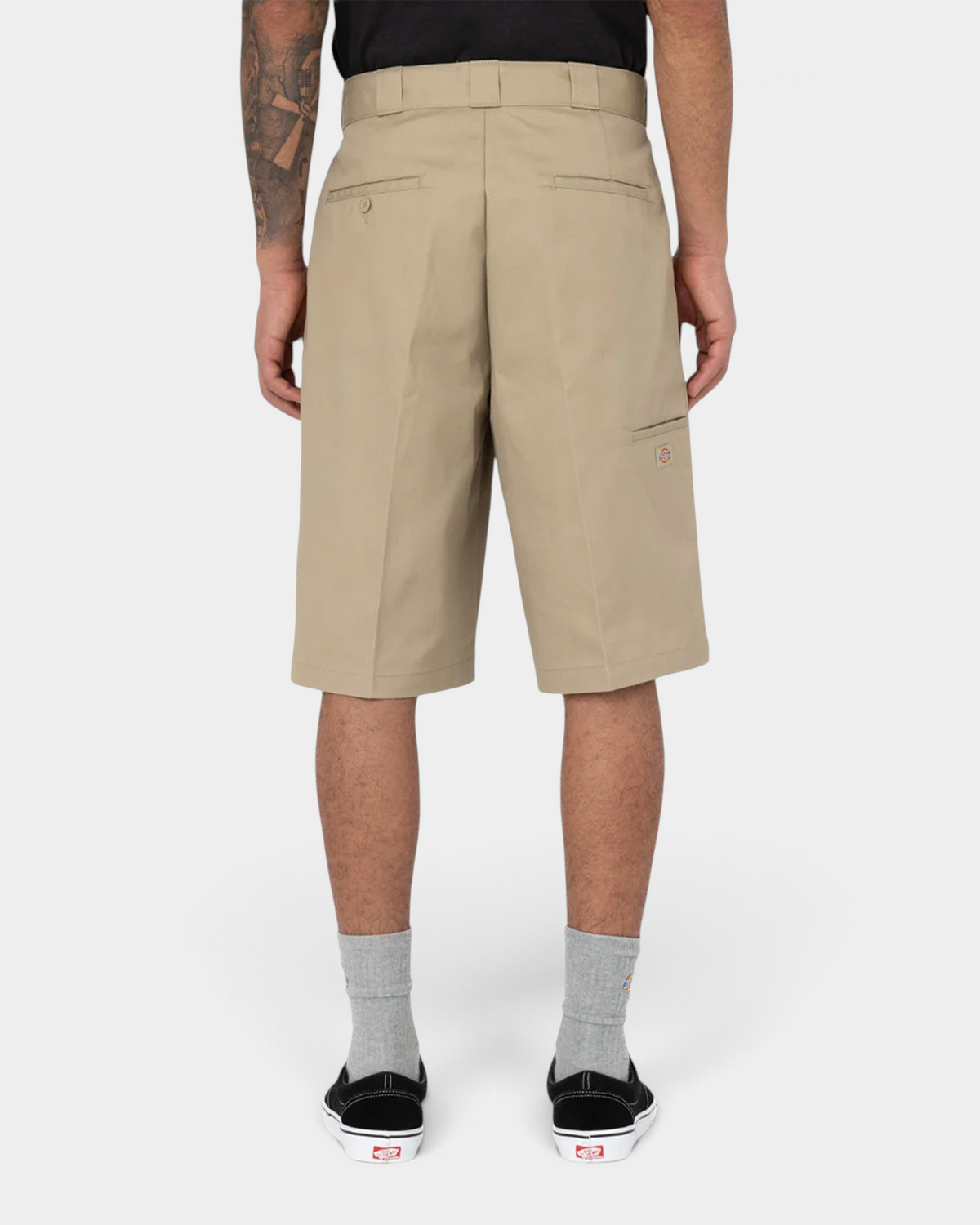 Lockwood Avenue model wearing stone Dickies 247 GD work shorts, back view with welt back pockets