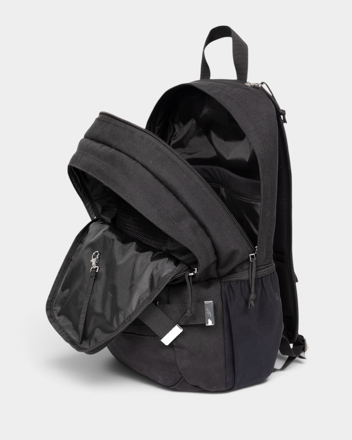 Eastpak x Dime Getter Backpack in Dime Black unzipped and open, showing the lined main compartment and the front organiser pocket