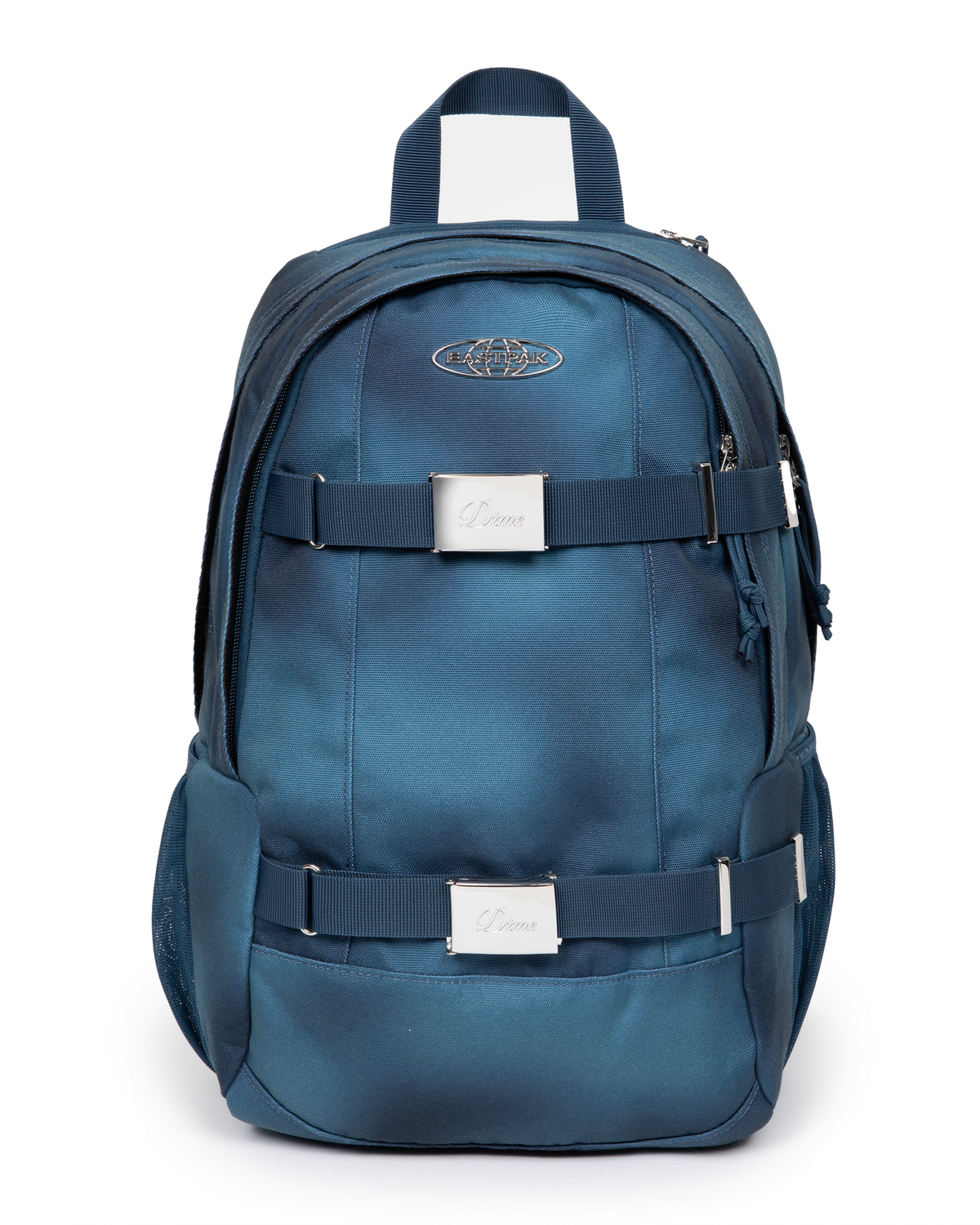Eastpak x Dime Getter Backpack in Dime Navy, front view of the sprayed navy fade canvas pack showing the chrome Eastpak globe badge and two webbing straps with engraved Dime buckle plates