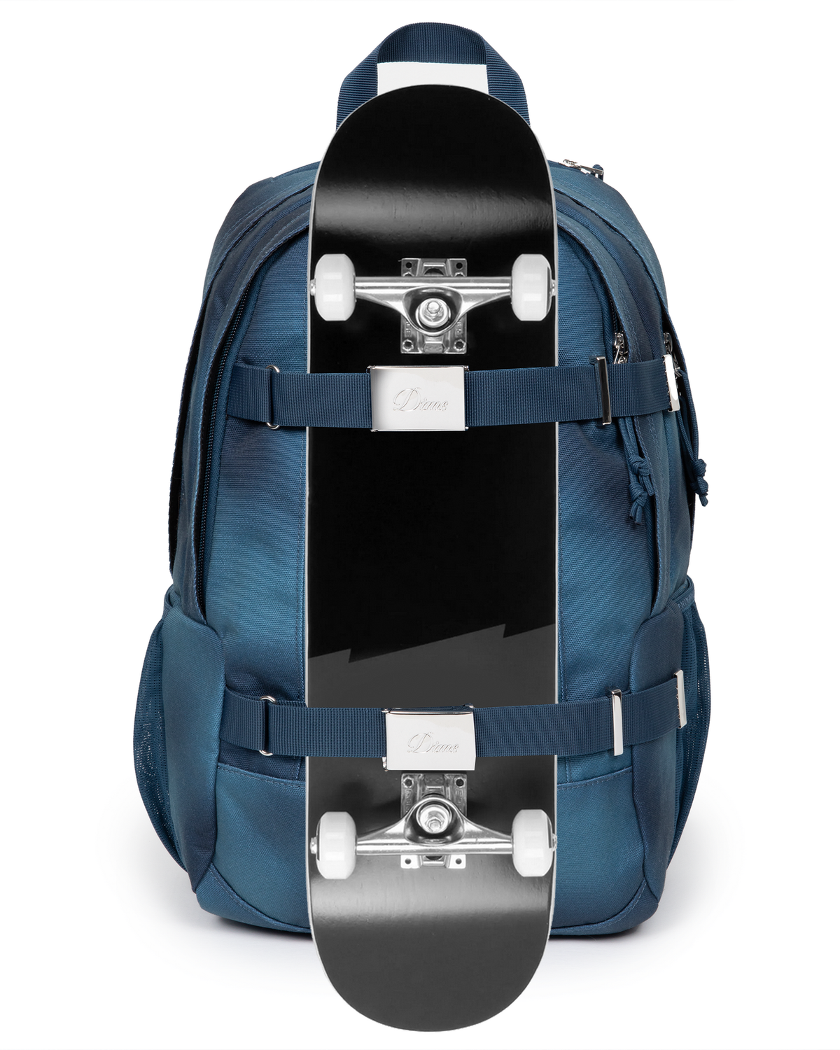 Eastpak x Dime Getter Backpack in Dime Navy with a skateboard strapped to the front under both webbing straps, showing how the board carry works